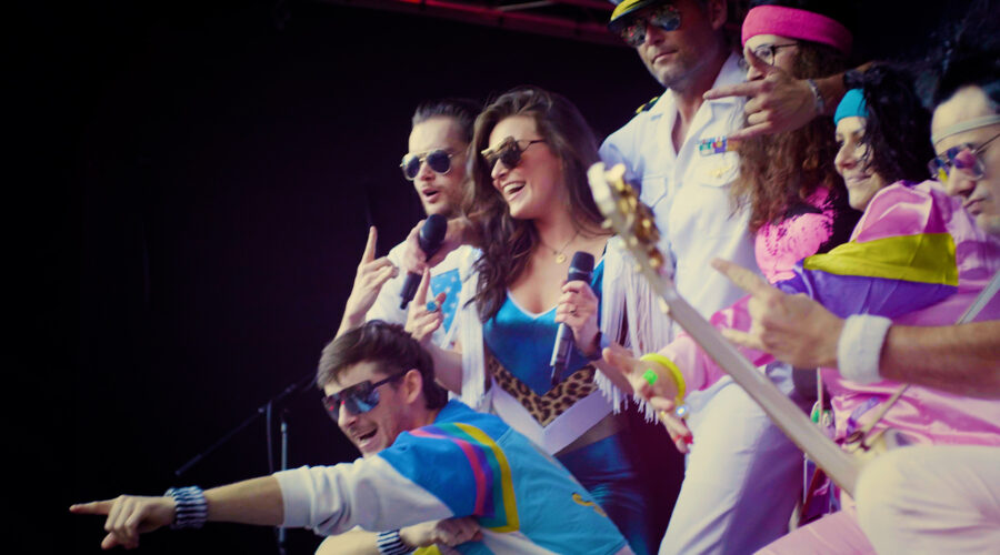 band performing on stage during an outdoor concert event