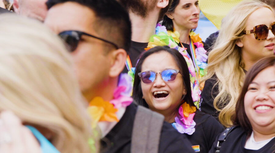 smiling laughing crowd at the Dublin Pride Parade