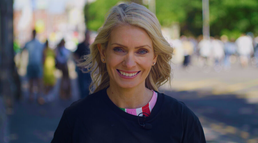 lady-smiling-to-camera-on-street