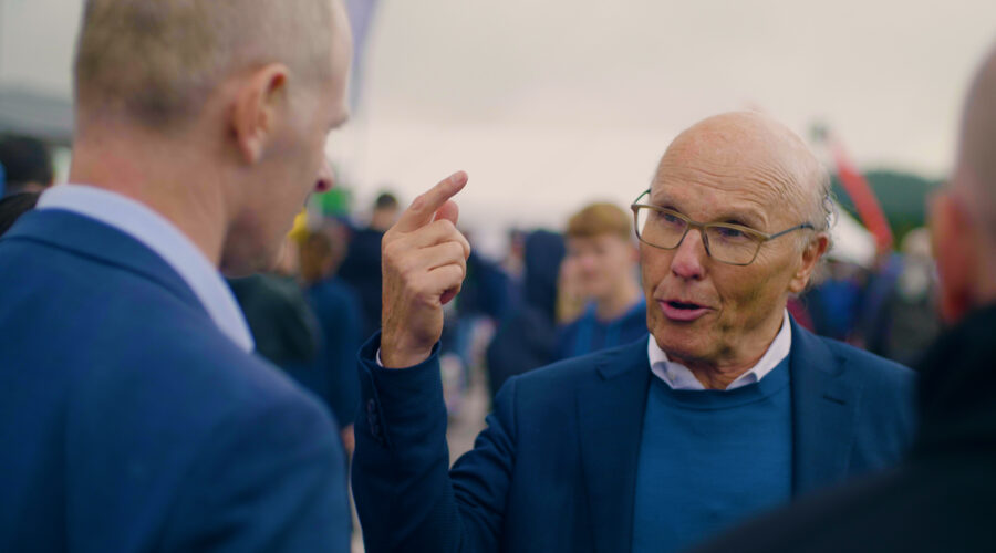 men-in-blue-suits-talking