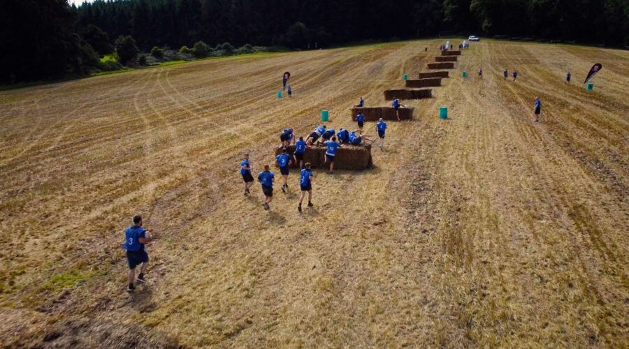 people-running-uphill-obstacle-course