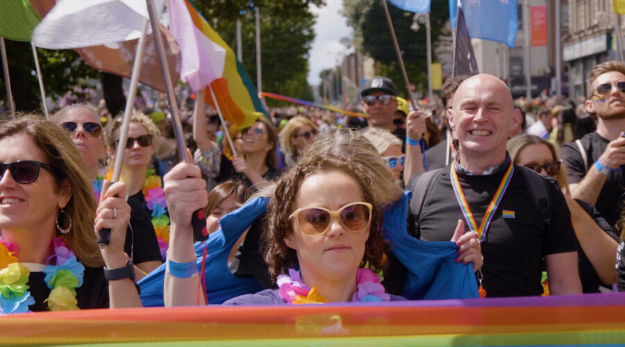 people-woith-flags-at-pride-parade