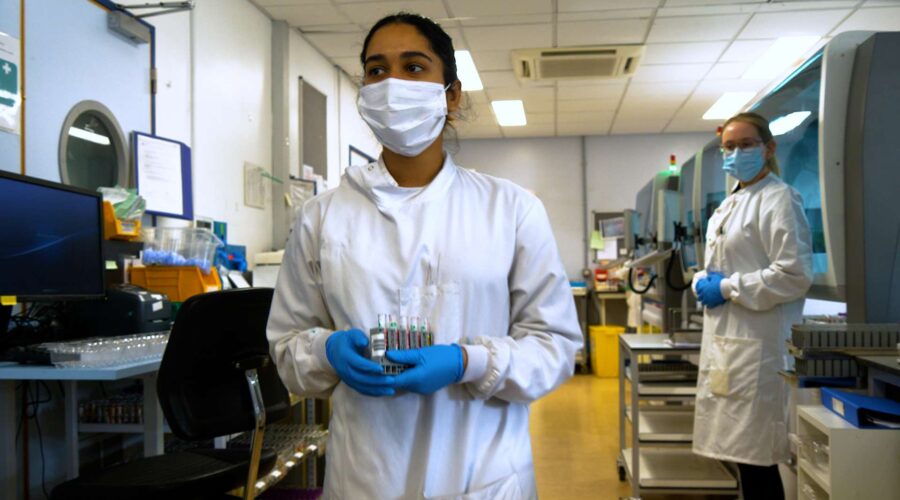 scientist-holding-samples