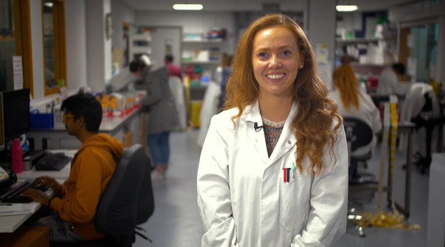 scientist-smiling-in-lab