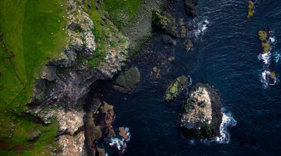 aerial drone view directly over Irish coastal sea stacks