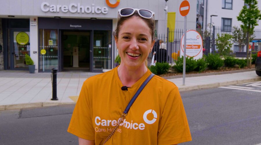 woman-in-orange-shirt