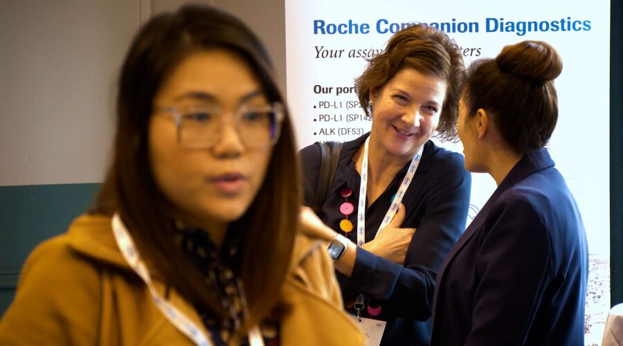 women-chatting-at-conference